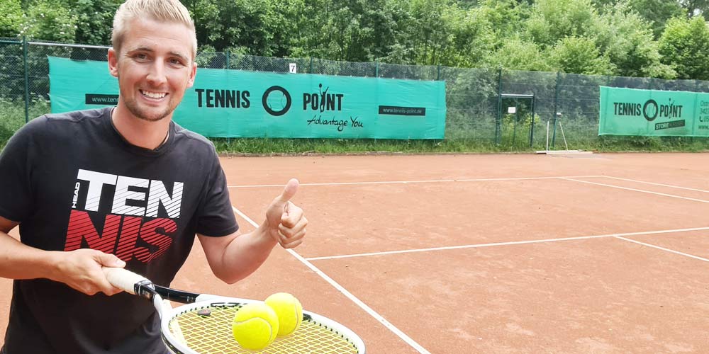 Coach collecting balls